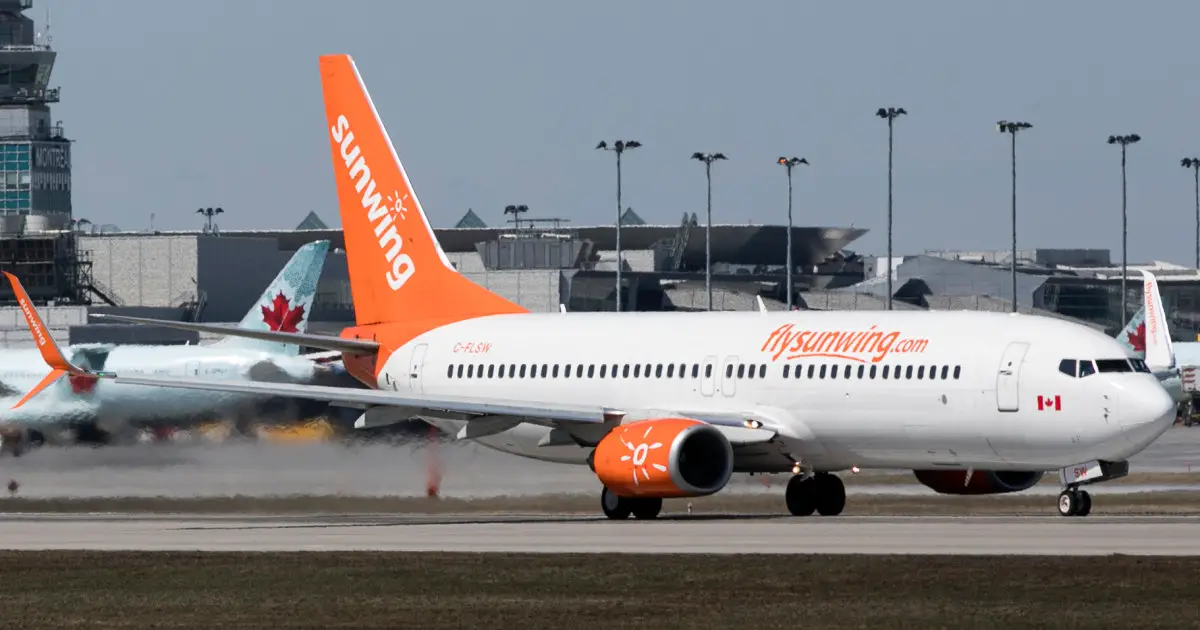 Canada asks regulator to probe maskless party on Sunwing flight as Covid cases soar