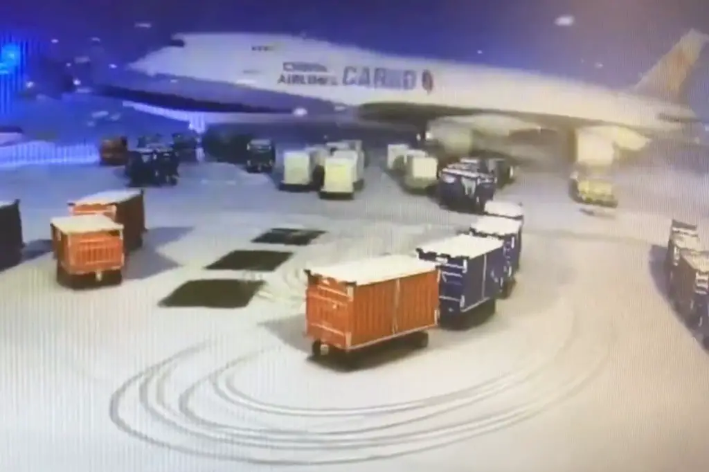 China Airlines jet smashes into baggage cart during snowstorm at Chicago O’Hare International Airport