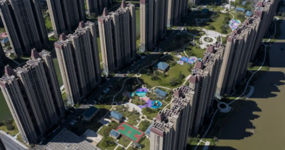 Embattled Chinese property developer Evergrande shares halted, set to release ‘inside information’
