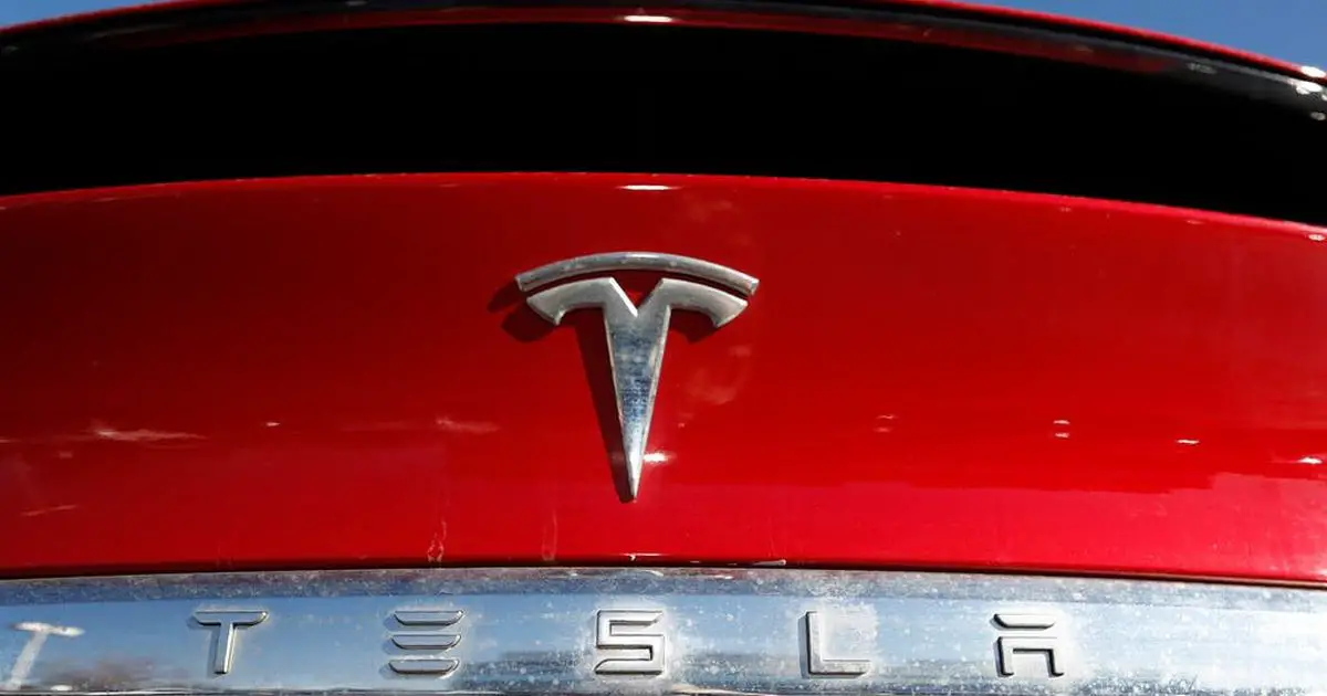 Tesla sales accelerate to record highs as electric cars defy industry slowdown