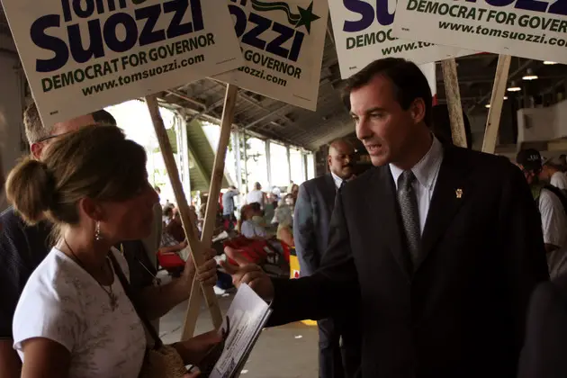 Democratic gubernatorial candidate Tom Suozzi, a 43-year-old Long Islander, campaigns on opening day at the Saratoga Race Course Wednesday, July 26, 2006, in Saratoga Springs, NY Tom Suozzi didn't score the clear knockout many political observers said he needed in the first Democratic debate of the governor's race, but he engaged the frontrunner in a feisty confrontation Suozzi is running behind Eliot Spitzer (AP Photo/Reid Burchell)