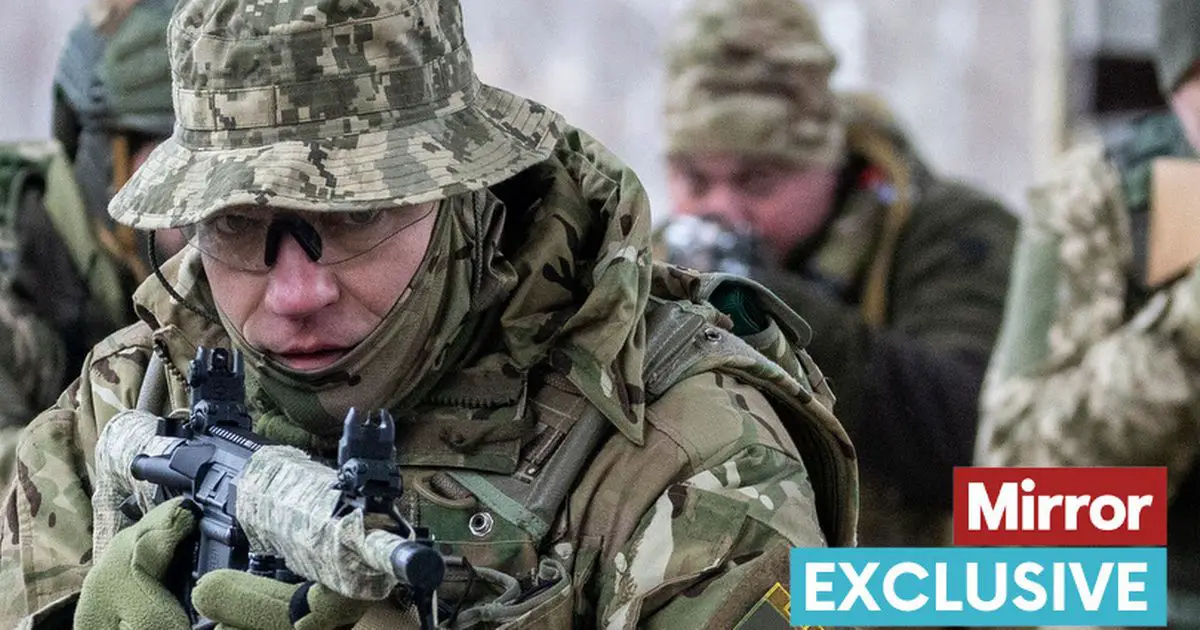 Ukrainian volunteer soldiers get ready to defend their country