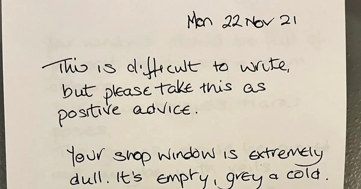 Wedding boutique receives 'savage' poison pen letter comparing her 'really bad' window displays to a graveyard or prison