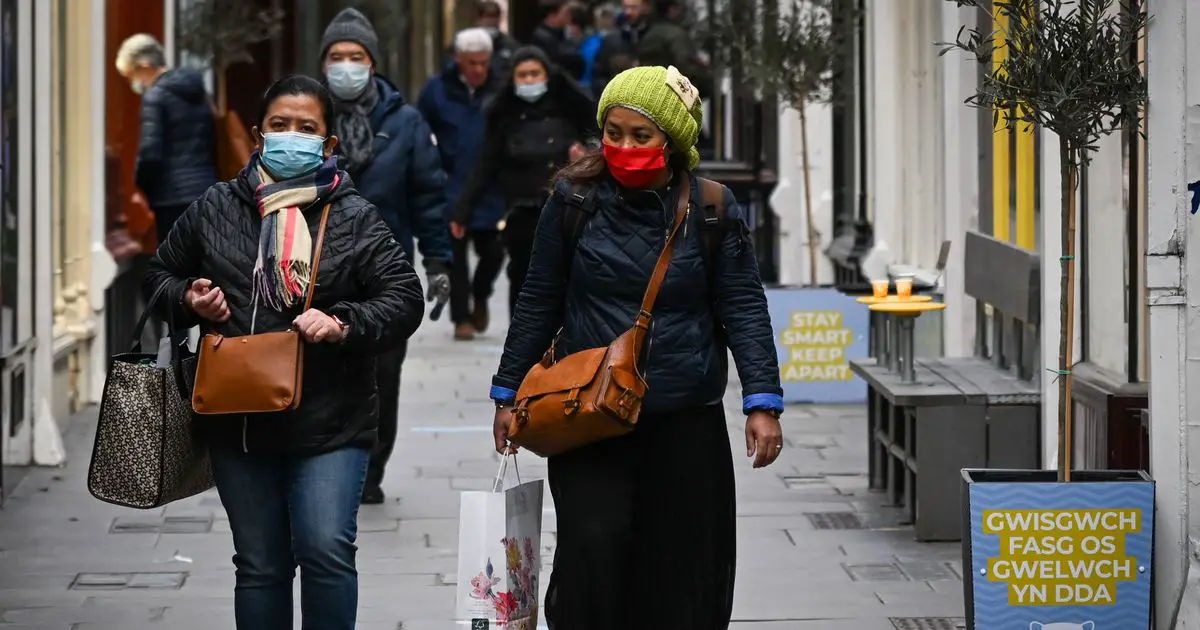 What are the rules for face coverings and masks in Wales and the rest of the UK?