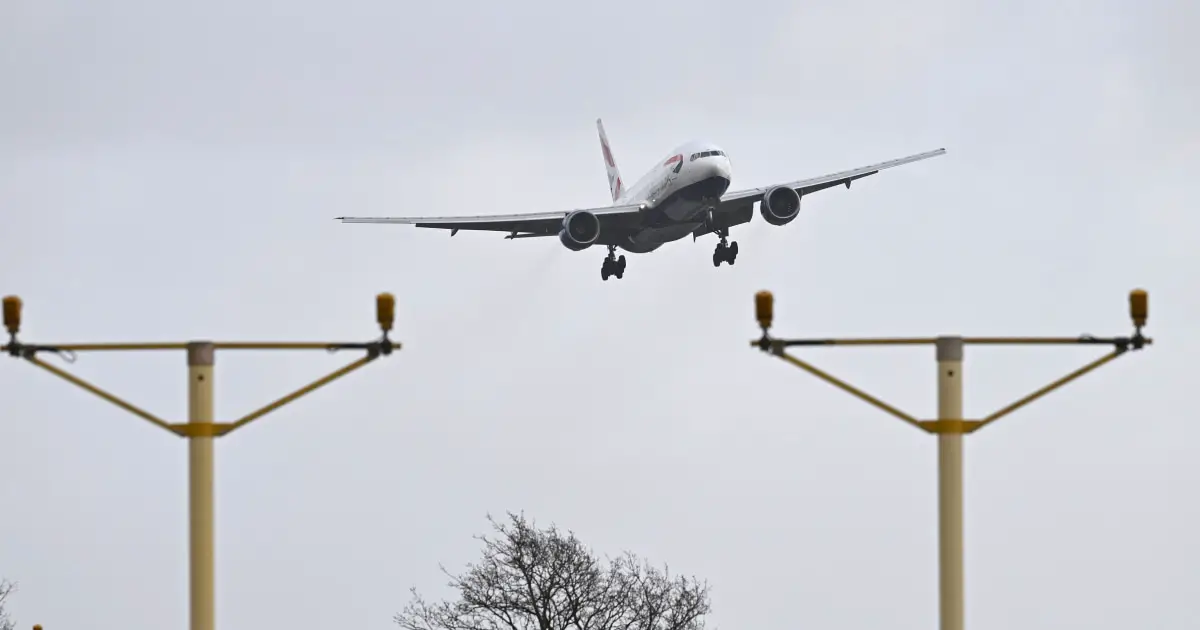 London Heathrow's landing strip becomes hit as thousands watch planes land amid high winds