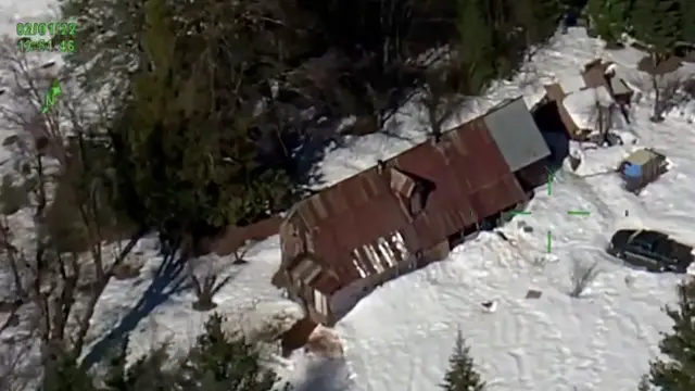 Two people and a dog rescued from snowed-in cabin after 58 days